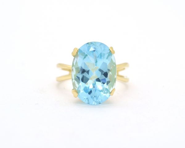 Anello oro giallo con topazio