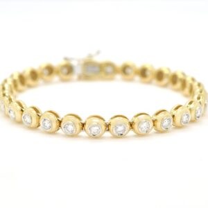 Bracciale tennis in oro giallo con diamanti