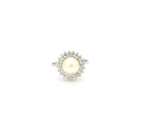 Anello in oro bianco con perla e diamanti doppio giro