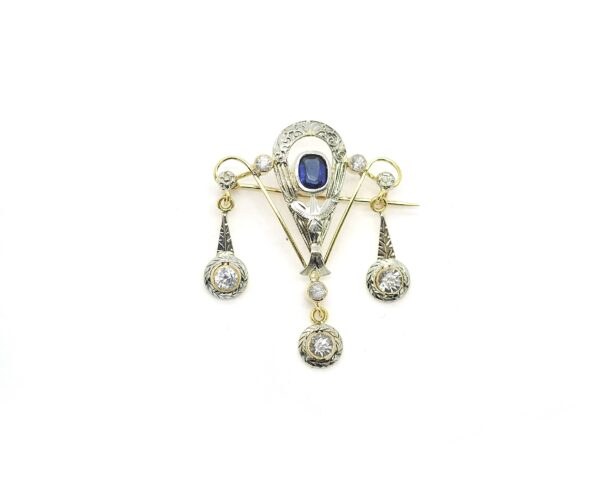 Spilla vintage in oro con zirconi