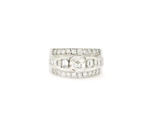 Anello fascia in oro bianco con diamanti