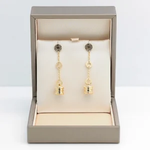 Orecchini Bulgari B.zero1 in Oro Giallo con Charm Pendenti